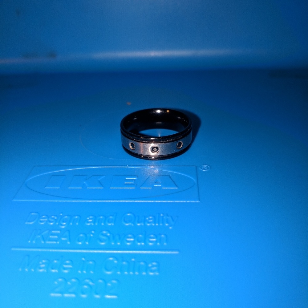 Mens Beautiful silver and black titanium ring.